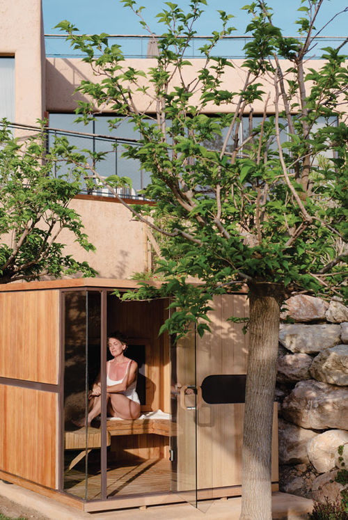 A guest in an infrared sauna at the Six Senses Ibiza's RoseBar. A guest in an infrared sauna at the Six Senses Ibiza's RoseBar.