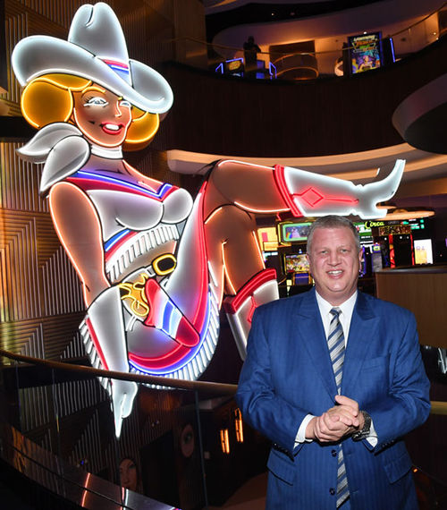 Circa Resort & Casino's CEO Derek Stevens with "Vegas Vickie," the iconic neon cowgirl that now resides in the resort's lobby Circa Resort & Casino's CEO Derek Stevens with "Vegas Vickie," the iconic neon cowgirl that now resides in the resort's lobby