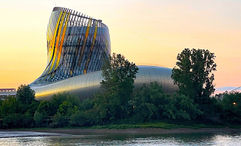 La Cite du Vin at sunset, as seen on a Garonne River dinner cruise.