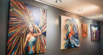 Carnival-inspired artwork can be found on the walls of We Culture, an 8,000-square-foot Carnival museum in Maho Bay, St. Maarten.
